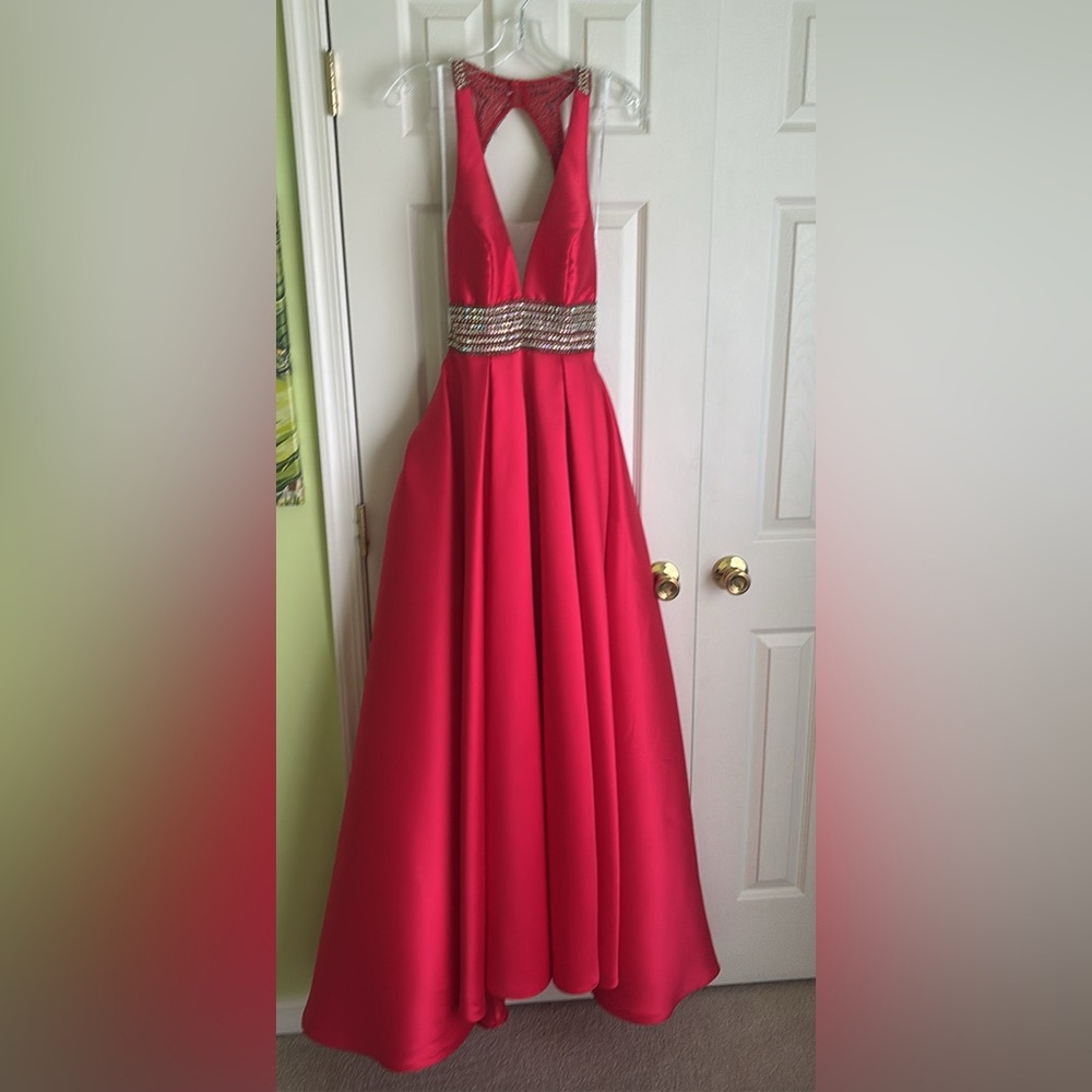 Elegant Red Gown with Gold Accents